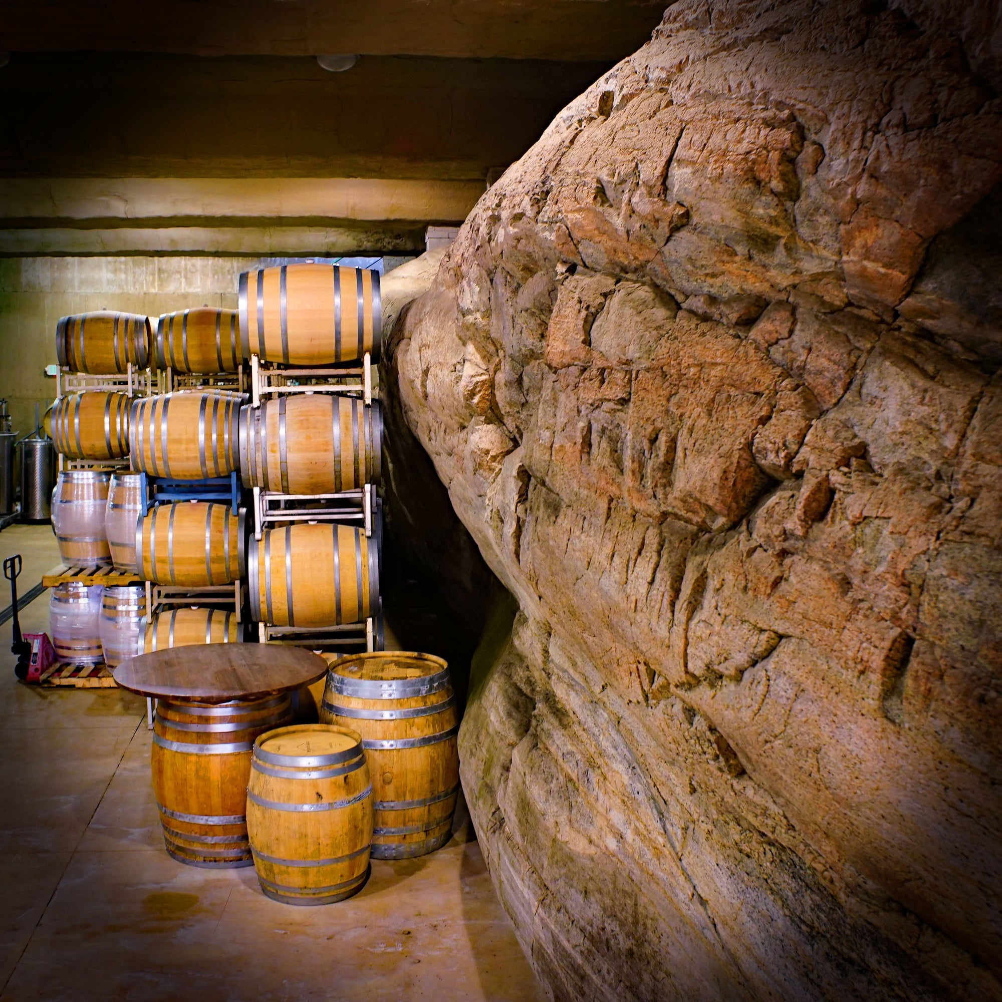 Natural oak barrel in the rock cellar at Pentâge Winery
